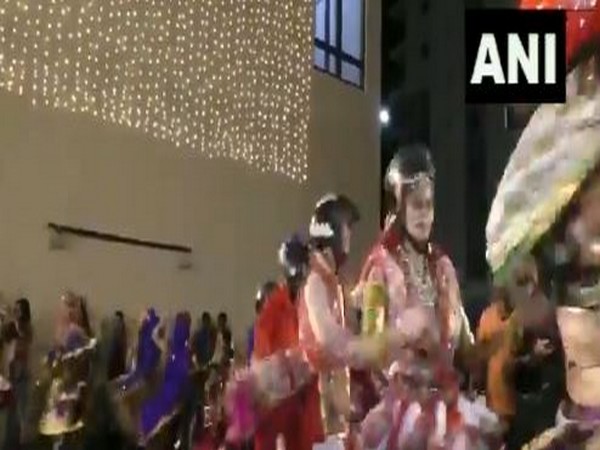 Dance group from a 'garba class' in Surat performs wearing helmets in a bid to promote awareness about usage of helmets