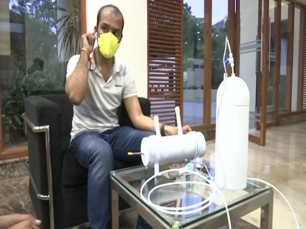 Co-Founder of The Phi Factory, Praveen Gorakavi with portable oxygenerator (Photo/ANI)