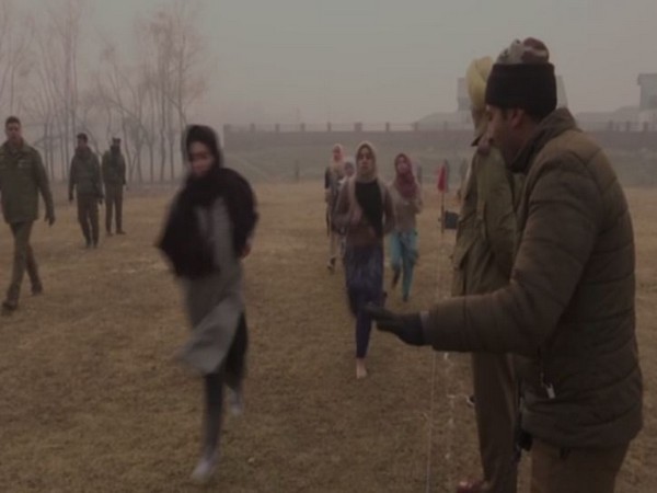 Girls running during the Railway recruitment drive in Srinagar on Friday (Photo/ANI)