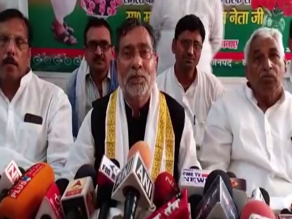 Samajwadi Party (SP) leader Ram Govind Chaudhary speaking to media persons in Ballia on Friday. Photo/ANI