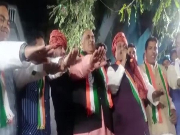 Video grab of Congress party workers taking oath in Indore. 