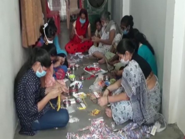 A group of women making rakhis in Prayagraj (Photo/ANI)
