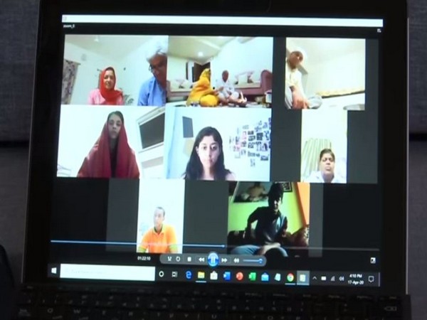 Bride, groom and their family members while attending the wedding via video call (Photo/ANI)