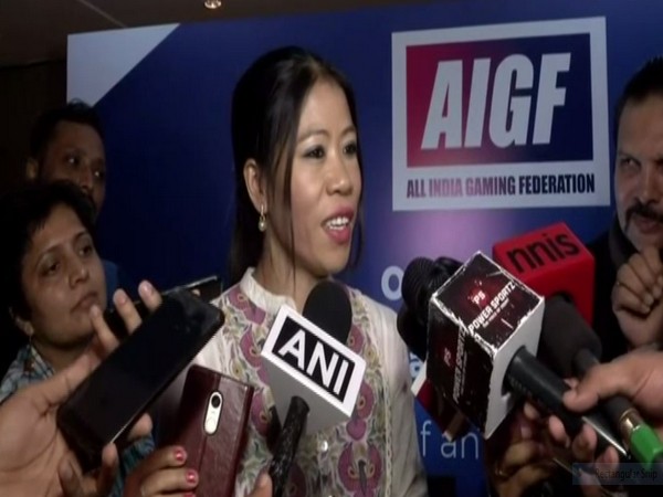 Indian boxer Mary Kom talking to media persons at the sidelines of an event in New Delhi on Wednesday. Photo/ANI