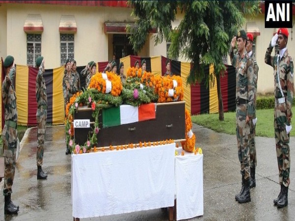 Indian Army paying tribute to martyr, Naik Krishan Lal on Wednesday. (Photo/ANI)