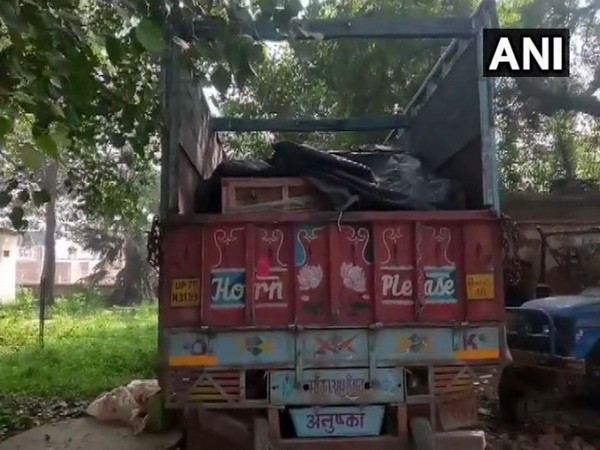 Police recovered cartons containing alcohol from six coffins in a truck (Photo/ANI)