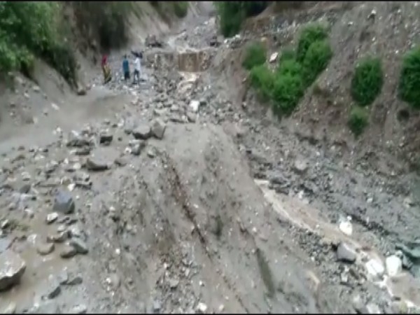 The road which was damaged after cloudburst on Thursday (Photo/ANI)