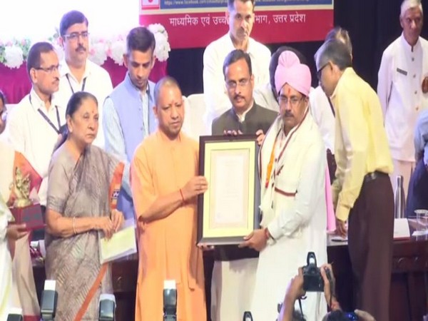 Governor Anandiben Patel and Chief Minister Yogi Adityanath while honouring teachers during an event in Lucknow on Thursday. (Photo/ANI)