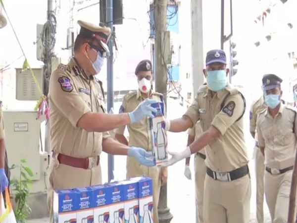 Hyderabad Police Commissioner, Anjani Kumar distributed Thermo steel bottles to police personnel (Photo/ANI)