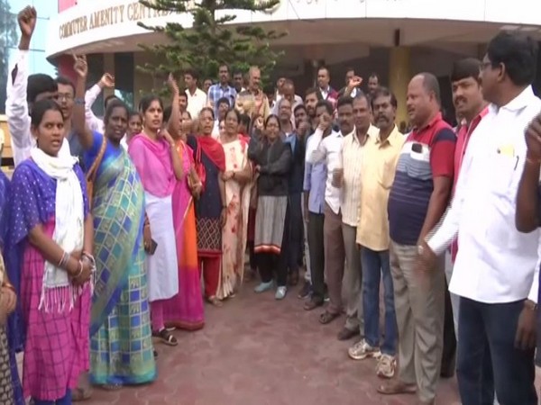 Telangana State Road Transport Corporation (TSRTC) employees demanding the state government to take necessary steps in order to resume the duties of the workers (Photo/ANI)