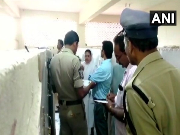 Police officials investigating the matter. (Photo/ANI)