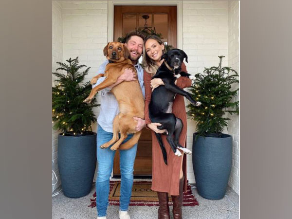 Chris Lane and Lauren Bushnell with their pet dogs (Image Courtesy: Instagram)