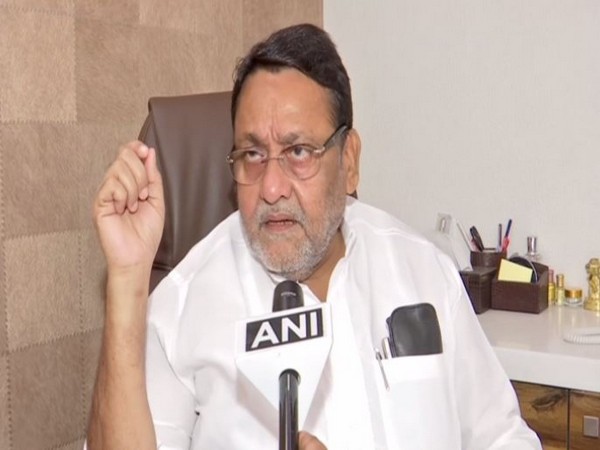 Nationalist Congress Party (NCP) spokesperson Nawab Malik speaking to ANI on Friday (Photo/ANI)