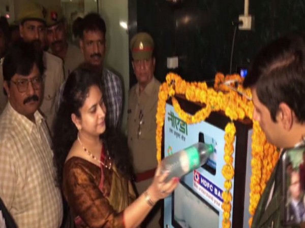 Noida Authority CEO, Ritu Maheshwari inaugurated a plastic bottle crusher machine at the authority campus on Friday (Photo/ANI)