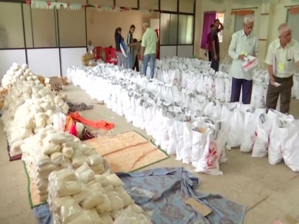 Rashtriya Swayamsevak Sangh (RSS) cadres send almost 5,000 to 6,000 food packets in flood-affected Sangli district. (Photo/ANI)
