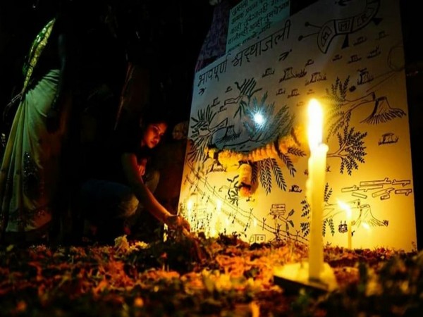 Members of the local Adivasi community paid tribute to the felled trees of Aarey forest in Mumbai on Tuesday. (Photo/ANI)