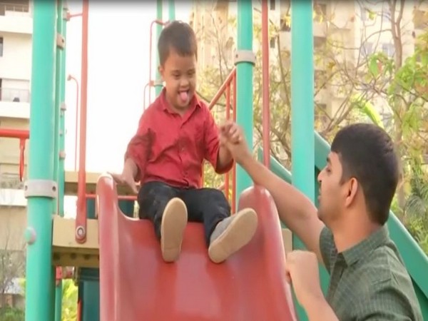 Aditya Tiwari (right) with his son Avnish (left) (Photo/ANI)