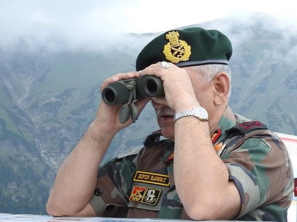 Army Chief on Saturday looks across Line of Control into Pakistan Occupied Kashmir. (Picture tweeted by Defence Ministry)
