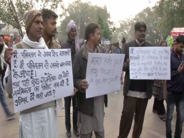 Pakistani Hindus staging a peaceful march in support of Citizenship Act in New Delhi on Friday. Photo/ANI