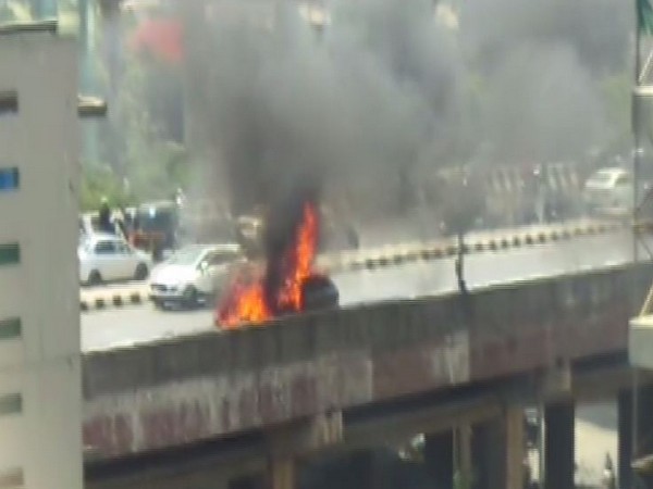 A car on Sunday caught fire at the Western Express highway in Mumbai