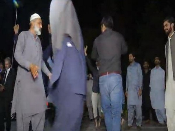 Pakistani nationals celebrating ouster of Imran Khan at National Assembly. (ANI)