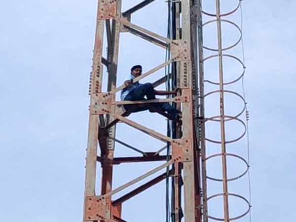 Narayana Swamy, who climbed a cell tower in Chittoor, Andhra Pradesh. Photo/ANI