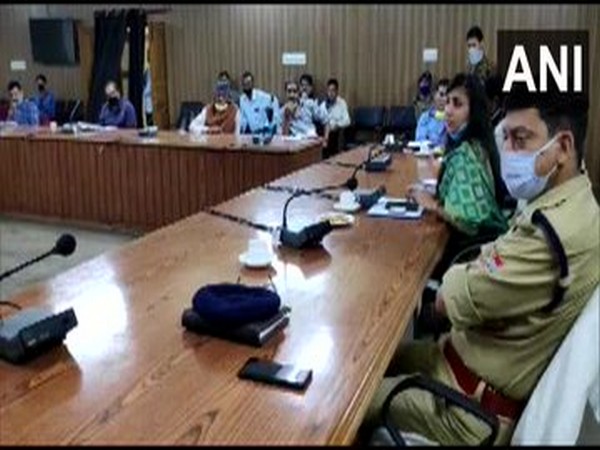 The District Magistrate of Chamoli Swati S Bhadauria holds meeting with stakeholder of Badarinath Temple on Monday. Photo/ANI
