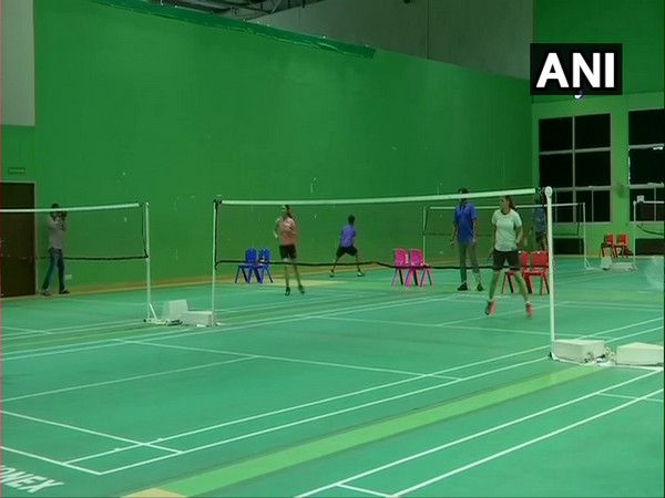 Players practicing at the badminton court while following all the precautions