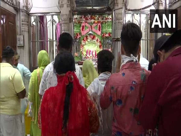 Devotees offer prayer at Gauri Shankar Temple in Chandni Chowk on Monday. (Photo/ANI)