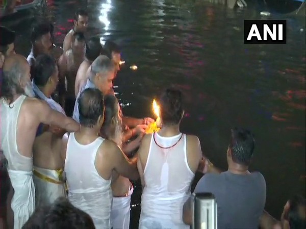Chief Minister Bhupesh Baghel taking a holy dip at Mahadev Ghat in Raipur on Monday. [Photo/ANI]