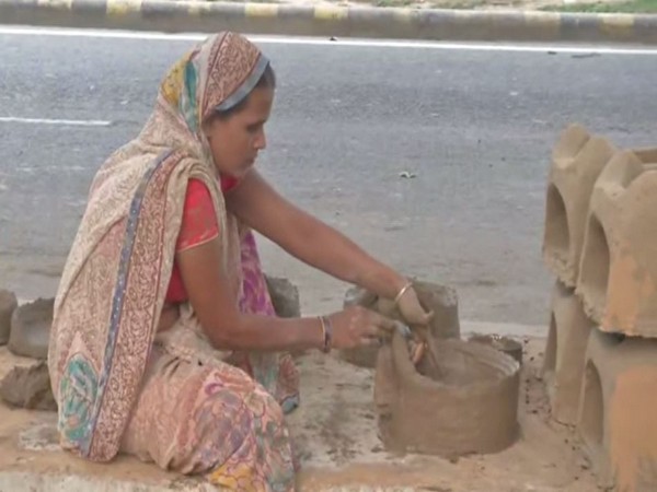 A muslim artisan preparing Earthen Chulha for Chhath Puja