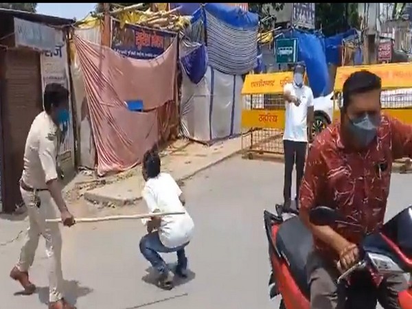 Visual from the viral video in which Basant Khalkho is seen beating a man. (Photo/ANI)