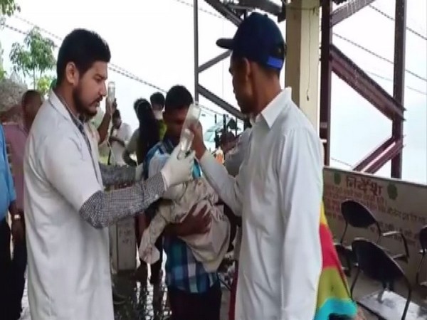 Accident victims receiving treatment after a school bus fell in to a gorge in Tehri Garhwal district on Tuesday. Photo/ANI