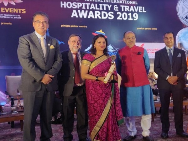 Chitra Awasthi, Director of Sales and Marketing in JW Marriott Mussoorie Walnut Grove Resort & Spa with the award