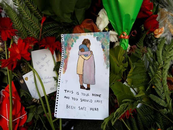 Flowers and messages after Christchurch attacks.