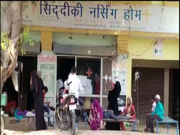 Patients being treated outside clinic in UP's Rampur. Photo/ANI