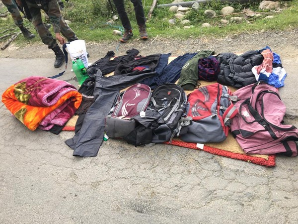    Clothes and other belongings left by terrorists after they managed to flee from the cordon and search operations launched in Kupwara village.