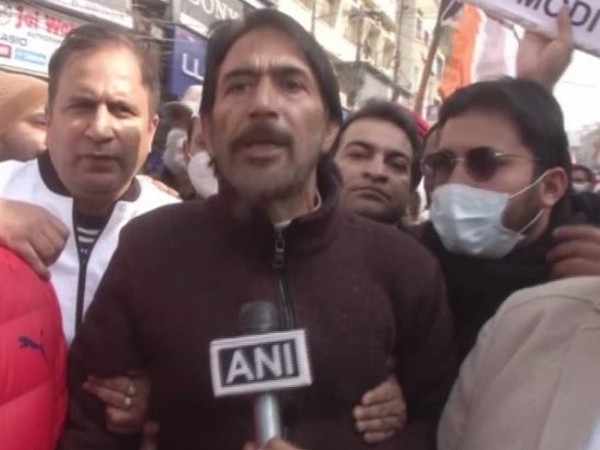    Jammu and Kashmir Congress Chief Ghulam Ahmed Mir holding a protest on Friday here in Jammu over farm laws. (Photo/ANI)