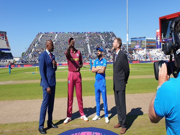 India skipper Virat Kohli and West Indies skipper Jason Holder during toss at Old Trafford