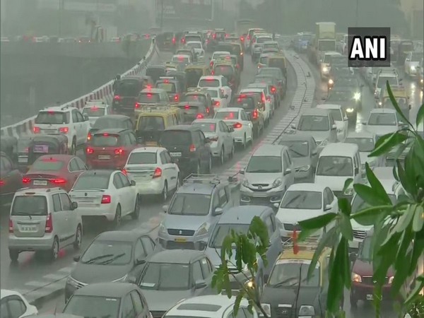 Traffic crawls on Western Express Highway as Mumbai receives heavy rainfall. [Photo/ANI]