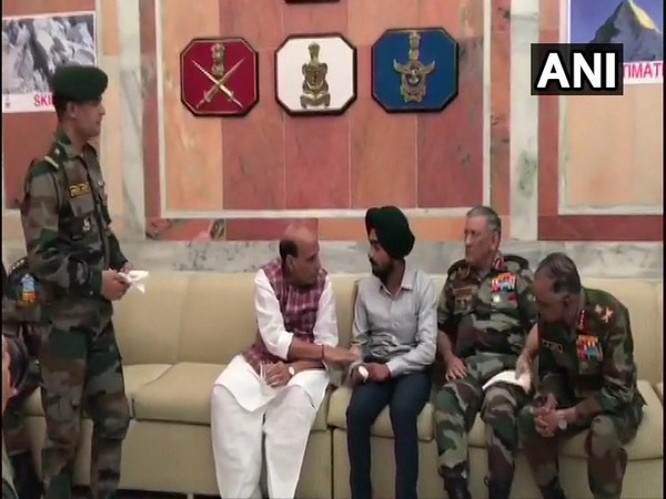 Defence Minister Rajnath Singh and Army Chief General Bipin Rawat with Captain HS Gill in New Delhi on Friday. Photo/ANI