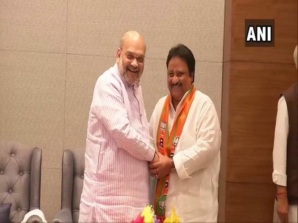 Jithender Reddy being inducted into BJP in New Delhi on Wednesday by party president Amit Shah. Photo/ANI