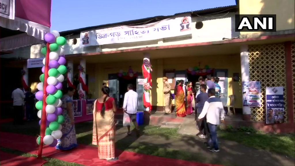 Voters line up outside polling booths 156 and 158 in Dibrugarh on Thursday