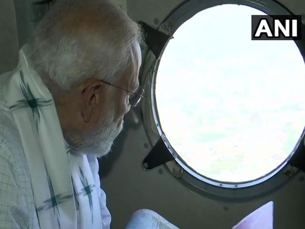 PM Modi carries out an ariel survey of flood affected areas in Odisha