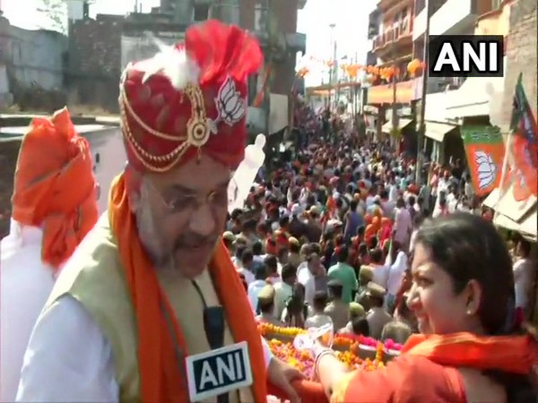 BJP president Amit Shah and Union Minister Smriti Irani during the roadshow in Amethi, Uttar Pradesh on Saturday. Photo/ANI