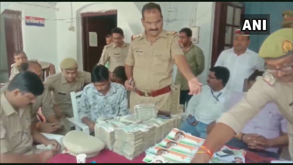 ECI's flying squad with accounted cash in Basti on Thursday (Photo: ANI)