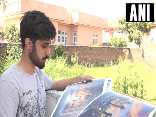 An Udhampur-based artist Abhinav Behal while showing some of his artwork (Source: ANI)