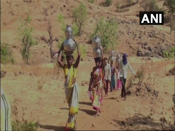 Woem often have to travel long distances to fetch water. Photo/ANI