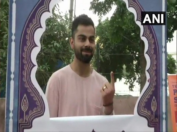 Indian Cricket team captain Virat Kohli cast his vote at a polling booth in Gurugram