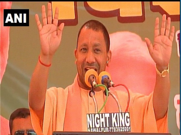 Uttar Pradesh Chief Minister Yogi Adityanath addressing a rally at Kushinagar on Monday. Photo/ANI